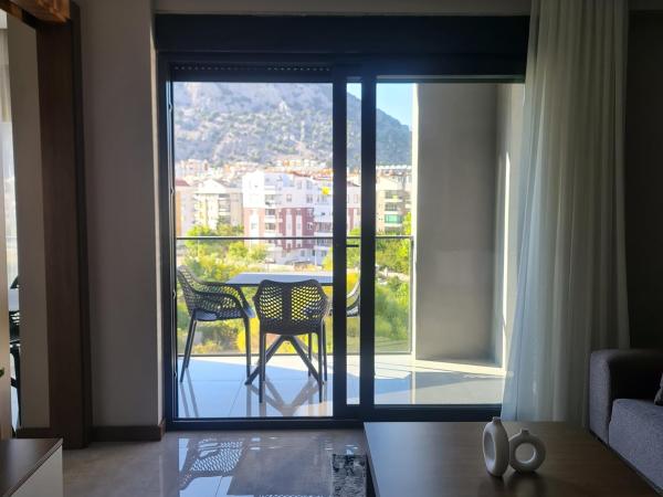 BİSUİTES : photo 6 de la chambre chambre quadruple - vue sur montagnes