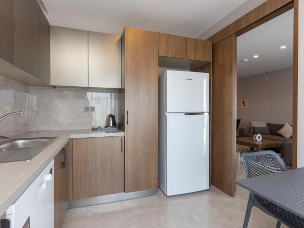 BİSUİTES : photo 7 de la chambre chambre quadruple deluxe