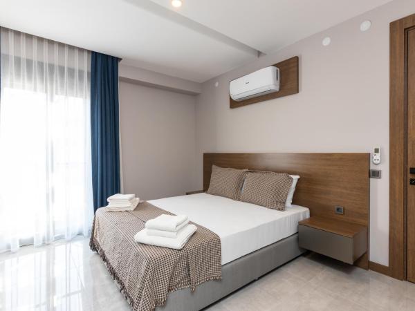 BİSUİTES : photo 8 de la chambre chambre quadruple avec balcon 