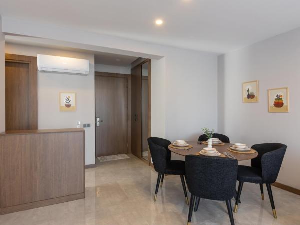 BİSUİTES : photo 5 de la chambre chambre quadruple avec balcon 