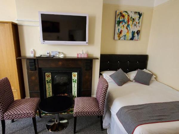 Diamonds Guest House : photo 4 de la chambre chambre quadruple supérieure