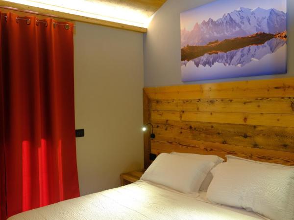 Arlette Chambres d'Hôtes : photo 5 de la chambre chambre deluxe (2 adultes + 1 enfant)