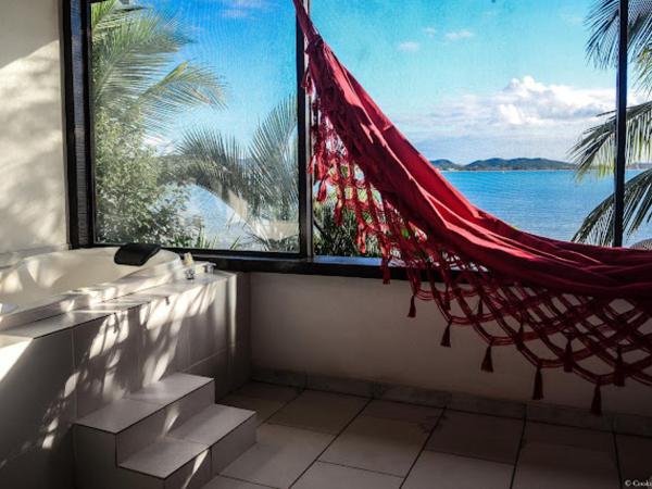 Barracuda Eco Resort Búzios : photo 1 de la chambre suite lit queen-size avec baignoire spa