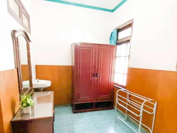 Hotel Shabine Rungkut Mitra RedDoorz : photo 7 de la chambre chambre double standard