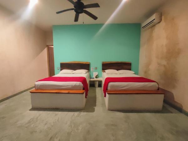 Corazon De Jade Tulum : photo 10 de la chambre room with two queen beds and private bathroom
