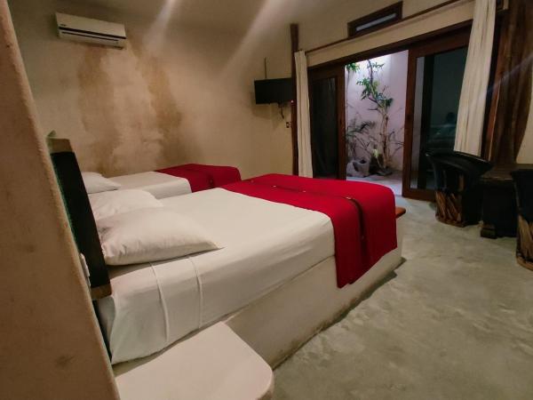 Corazon De Jade Tulum : photo 9 de la chambre room with two queen beds and private bathroom