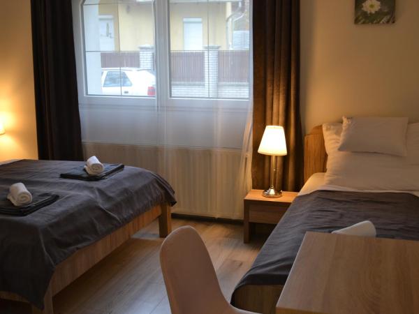 Főnix Design Rooms : photo 9 de la chambre chambre triple