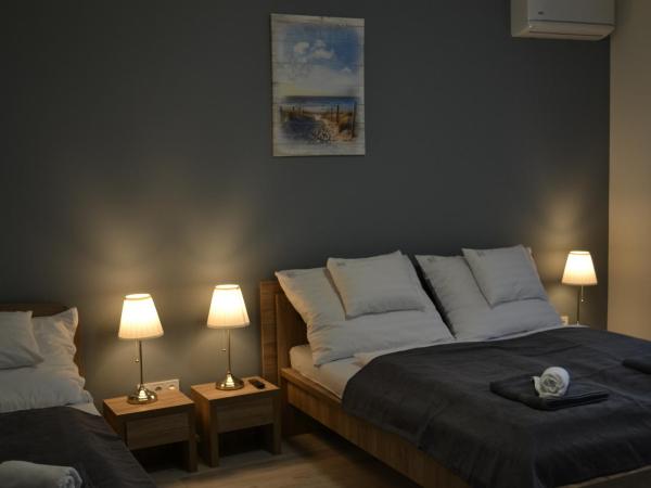 Főnix Design Rooms : photo 9 de la chambre chambre triple