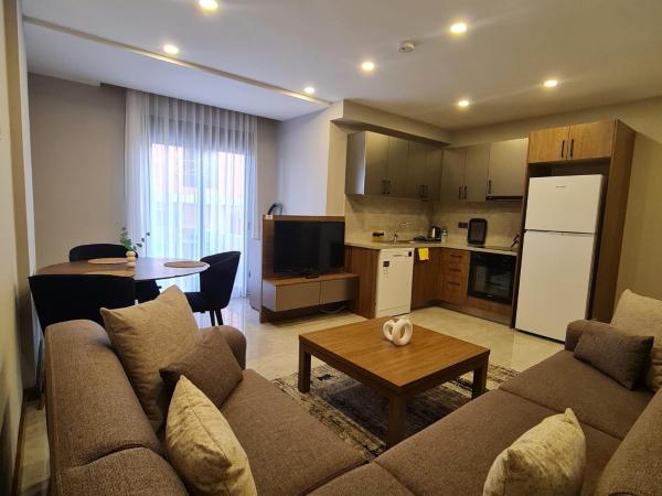 BİSUİTES : photo 1 de la chambre chambre quadruple avec terrasse 