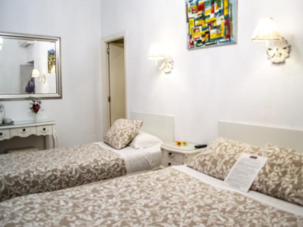 Un Patio en Santa Cruz : photo 5 de la chambre chambre double avec lit d'appoint