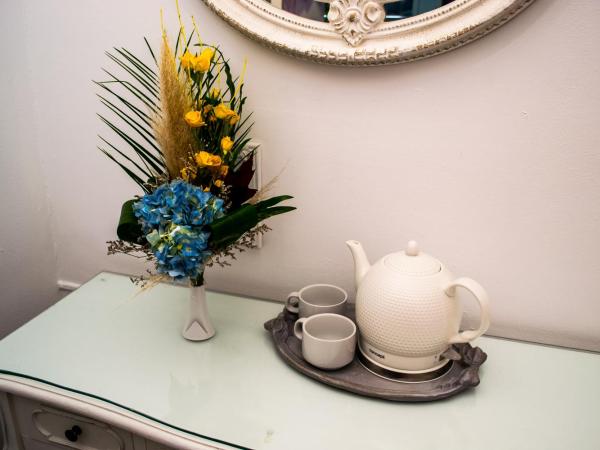 Un Patio en Santa Cruz : photo 1 de la chambre chambre double avec lit d'appoint