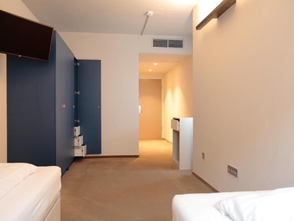 Maverick Urban Lodge : photo 4 de la chambre chambre lits jumeaux standard