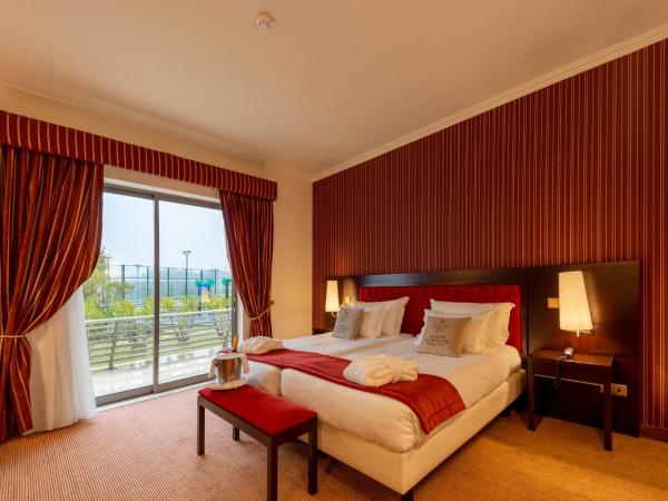 Palacio São Silvestre-Boutique Hotel : photo 4 de la chambre chambre double de luxe avec balcon - vue sur piscine