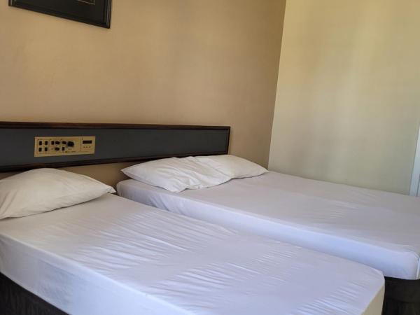 Hotel Estação Express : photo 9 de la chambre chambre triple