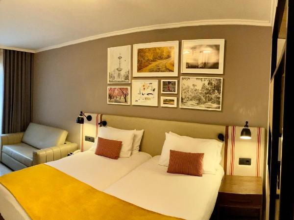 Hotel Indigo Madrid - Princesa, an IHG Hotel : photo 3 de la chambre chambre lits jumeaux premium avec canapé