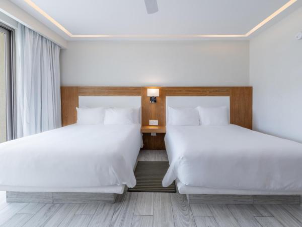 Izla Beach Front Hotel : photo 5 de la chambre hébergement double deluxe - vue sur océan