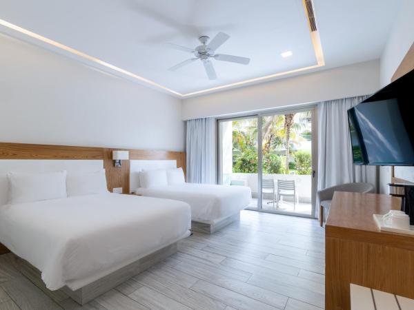 Izla Beach Front Hotel : photo 5 de la chambre chambre double - vue sur jardin