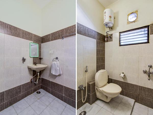 NirmalVilla Cherry : photo 5 de la chambre chambre double deluxe (2 adultes + 1 enfant)