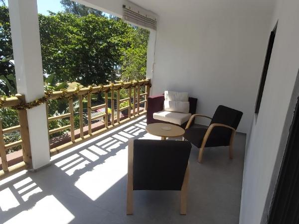 Résidence au bout du Morne : photo 3 de la chambre chambre double deluxe - vue sur mer