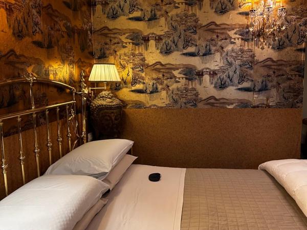 LU Suites : photo 9 de la chambre chambre supérieure lit queen-size