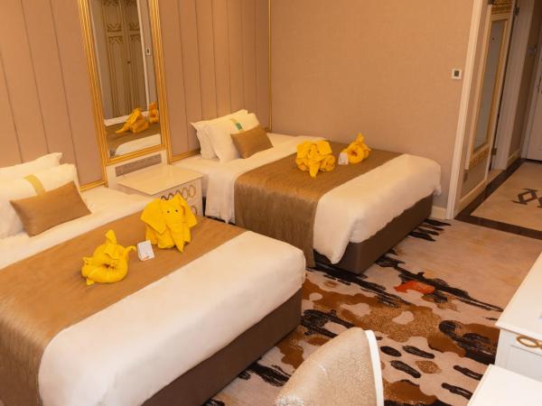 Puteri Wing - Riverside Majestic Hotel : photo 1 de la chambre chambre lits jumeaux de luxe 