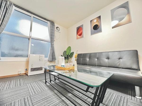 attomi hostel : photo 4 de la chambre chambre quadruple avec salle de bains