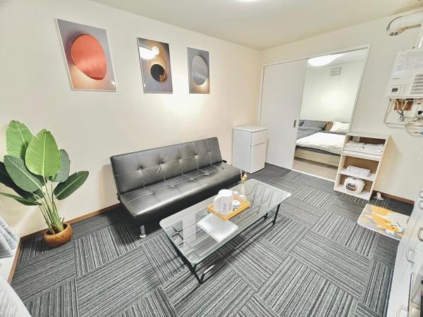 attomi hostel : photo 1 de la chambre chambre quadruple avec salle de bains