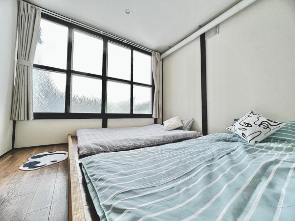 attomi hostel : photo 6 de la chambre chambre quadruple avec salle de bains privative