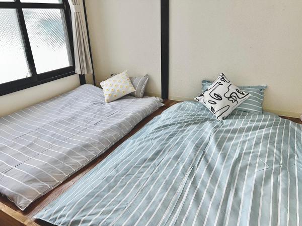 attomi hostel : photo 7 de la chambre chambre quadruple avec salle de bains privative