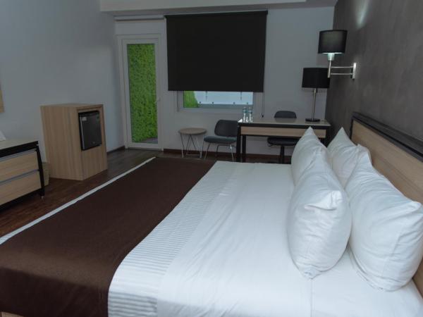 Fato Hotel : photo 2 de la chambre chambre double ou lits jumeaux supérieure avec terrasse