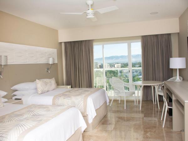 Krystal Grand Puerto Vallarta - All Inclusive : photo 2 de la chambre hébergement double de luxe - vue partielle sur océan