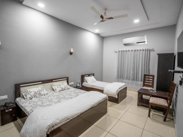 RESORT GOLDEN CAVE : photo 5 de la chambre chambre triple de luxe