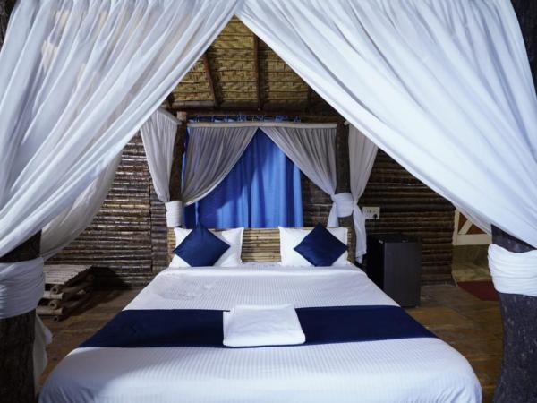 Farm Stay Resort - Shamirpet, Hyderabad : photo 1 de la chambre chambre lit king-size