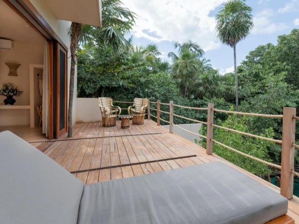 La Valise Tulum, member of Small Luxury Hotels : photo 6 de la chambre suite principale cénote - côté jungle