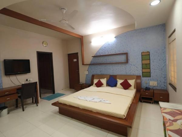 Elis Hospitality Service Parth Bungalow : photo 1 de la chambre chambre deluxe