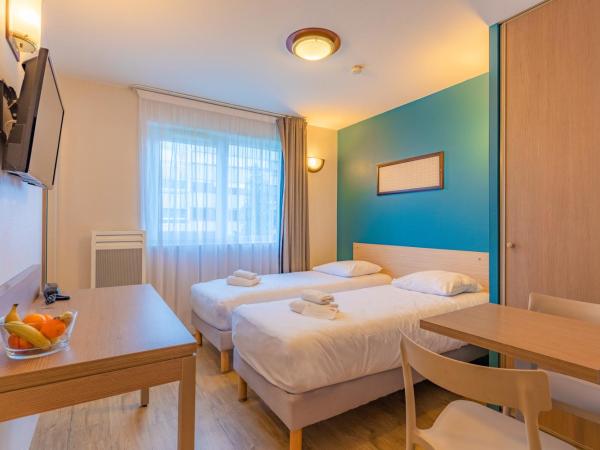 Appart'City Classic La Roche sur Yon Centre : photo 1 de la chambre studio lits jumeaux