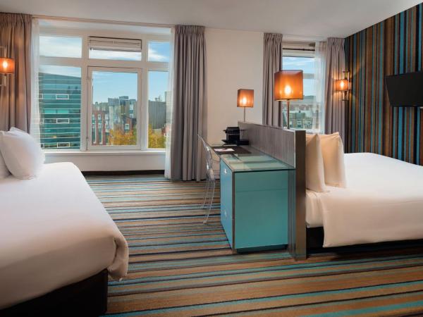 WestCord City Centre Hotel : photo 1 de la chambre chambre triple - vue sur ville