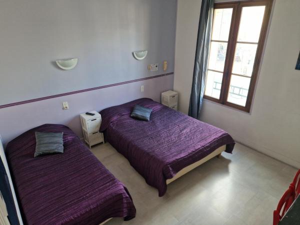 Hôtel du Commerce : photo 9 de la chambre chambre triple