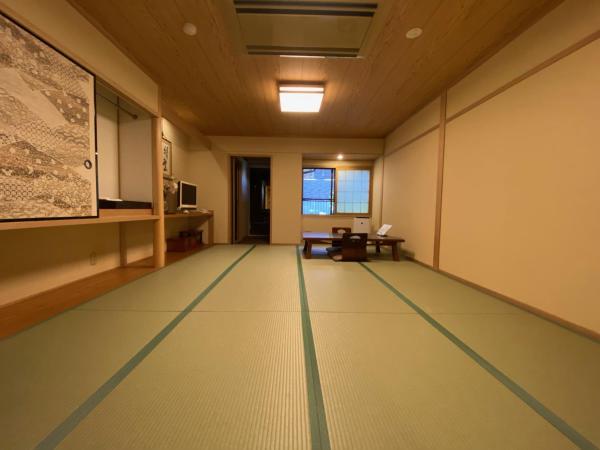 Ryokan Sawaya Honten : photo 1 de la chambre chambre quadruple supérieure