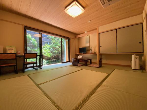 Ryokan Sawaya Honten : photo 3 de la chambre chambre lits jumeaux supérieure - vue sur jardin