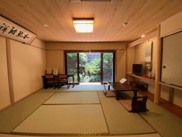 Ryokan Sawaya Honten : photo 4 de la chambre chambre lits jumeaux supérieure - vue sur jardin