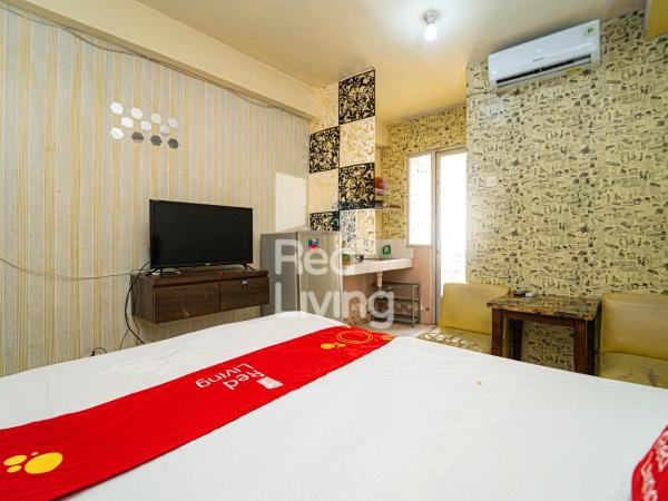 RedLiving Apartemen Kalibata City - Homy Jasen Tower Jasmine : photo 6 de la chambre studio
