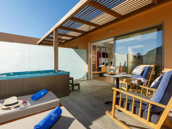 Palmera Beach Hotel & Spa - Adults Only : photo 5 de la chambre chambre deluxe avec jacuzzi extérieur - vue sur ville