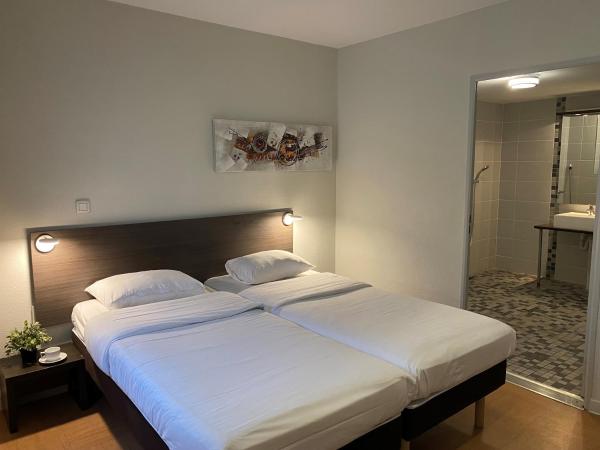 ApartHotel Sainte-Marthe : photo 2 de la chambre studio accessible aux personnes à mobilité réduite