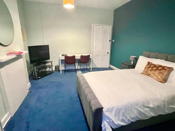 The Blue Piano Guesthouse : photo 2 de la chambre suite 2 chambres