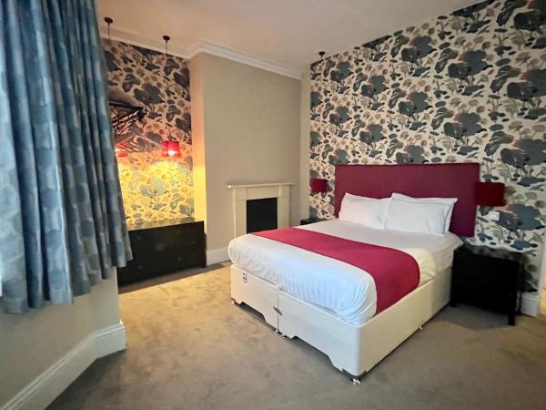 The Blue Piano Guesthouse : photo 1 de la chambre suite lit king-size