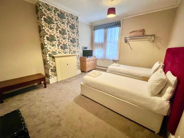 The Blue Piano Guesthouse : photo 3 de la chambre suite lit king-size