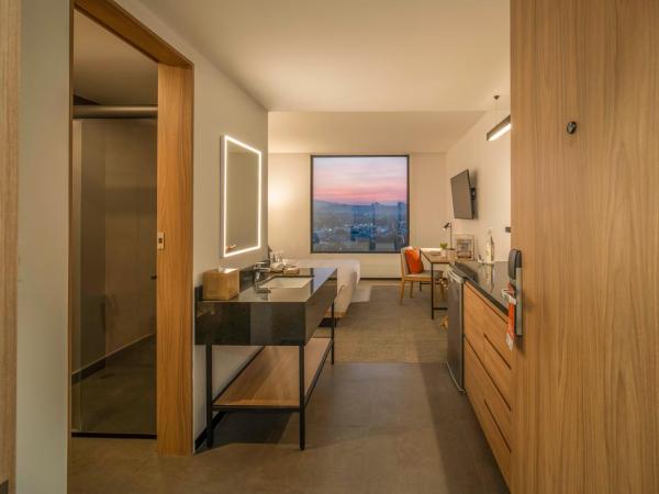 Stadía Suites Querétaro Centro Histórico : photo 10 de la chambre chambre lit king-size deluxe