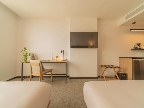 Stadía Suites Querétaro Centro Histórico : photo 9 de la chambre chambre double deluxe