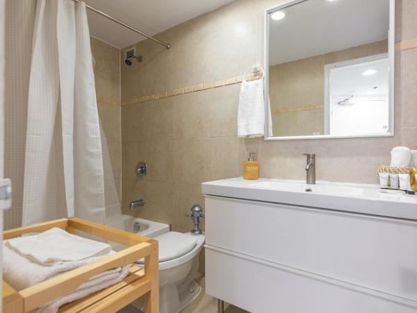 Girasole Apartments : photo 7 de la chambre suite lit queen-size deluxe